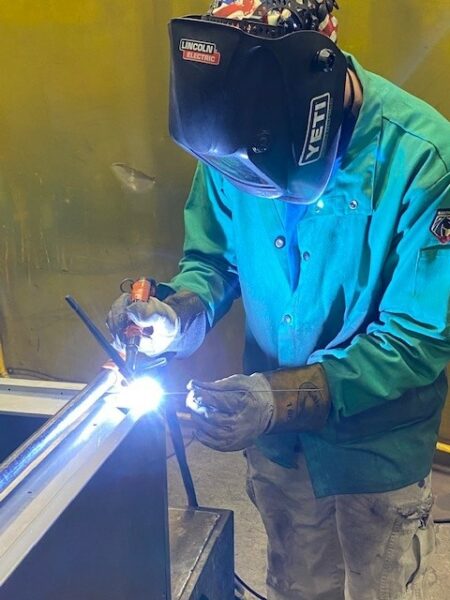 man welding