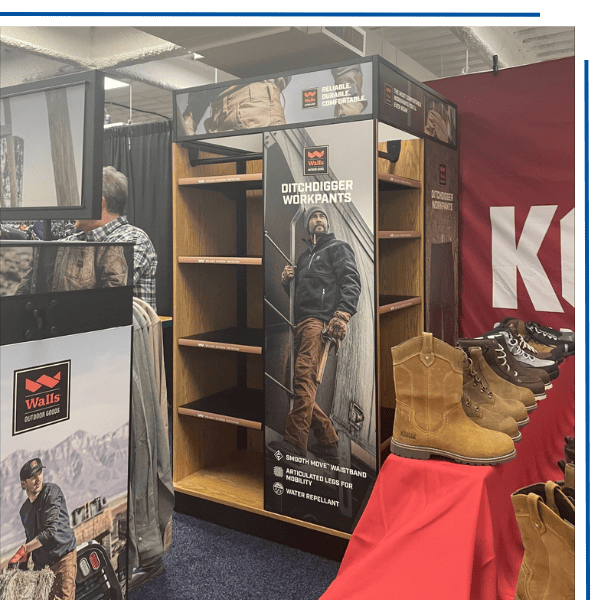 Walls Outdoor Goods Retail Display featuring shelving and signage with boots on display